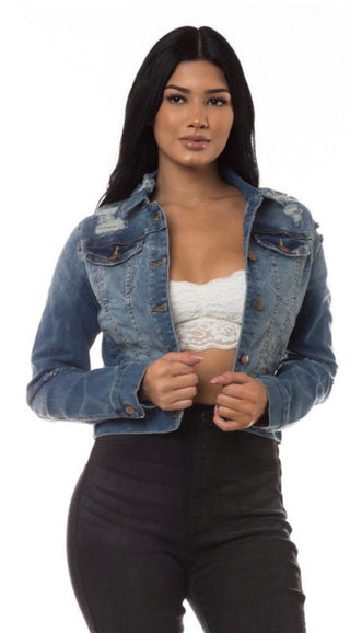 Distressed Medium Wash Jean Jacket with two upper chest pockets and button-enclosure front and sleeves